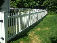 <b>White vinyl contemporary picket fence with contemporary post caps</b>